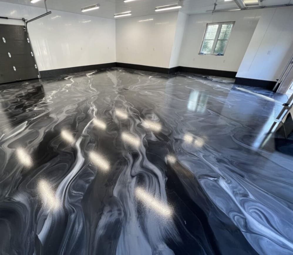 Black and silver metallic epoxy garage floor by Titan Floor Systems in Ontario